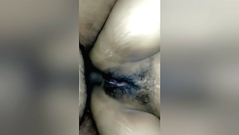 Indian amateur anal video shows a girl's hairy pussy