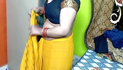 Indian bhabhi in a yellow sari video in a white dress 049