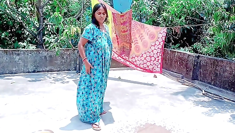 Brunette in red dress having intimate sex with a mechanic