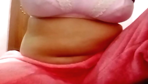 Solo female has her fingers on her pussy on a webcam