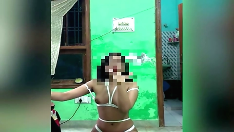 Indian video with a sexy naked brunette in a webcam