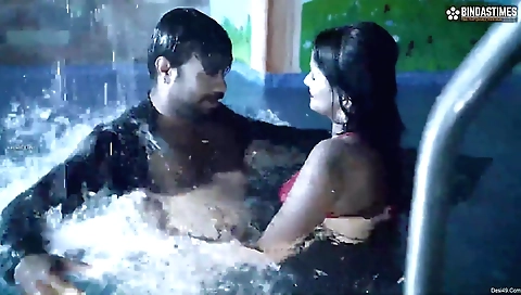 Indian lady in the pool is doing some funny things