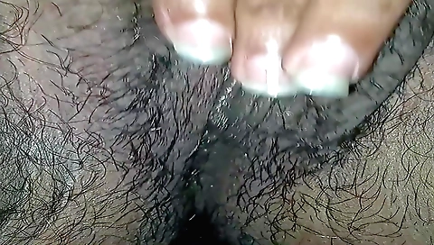 Hairy nude beauty with beautiful face masturbating at home