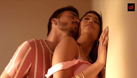 Milf in a long black dress and stockings is playing with her hands