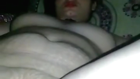 Indian milf is getting off on a regular basis in her bedroom