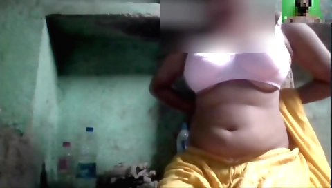 Amateur brunette rubs and touches pussy at the house