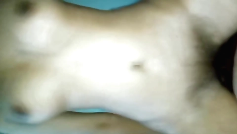 Busty Indian brunette with hairy pussy takes a position