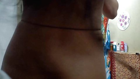 Indian porn film with a black girl in a black dress