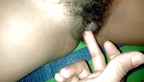 Sexy babe is masturbating on the bed in a sexy pose