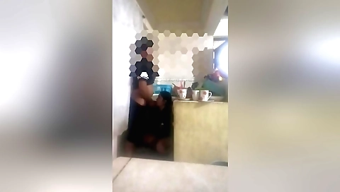 Brunette girl is getting humped in the kitchen from the guy