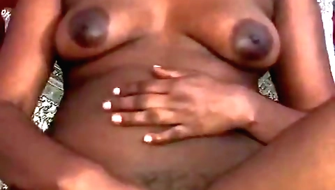 Amateur brunette plays with her hairy pussy on webcam