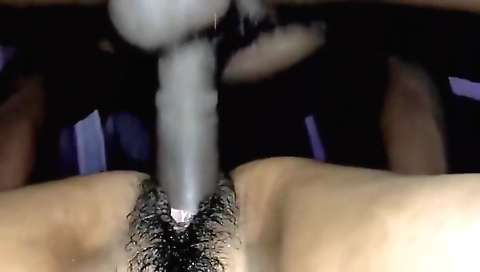 Hairy chick in a sexy home made video taking on a guy