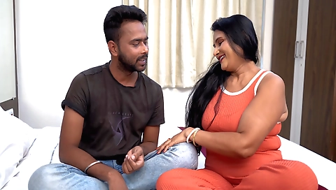 Big ass brunette milf enjoys having a hot guy with her