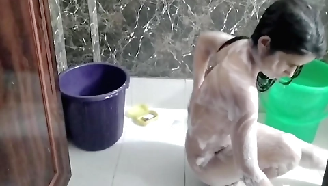 Indian chick licking her pussy in a luxurious solo scene