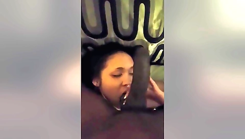 Amateur girl with a pretty face is giving a handjob