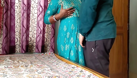 Amateur brunette with a sexy and hot body is in a bedroom