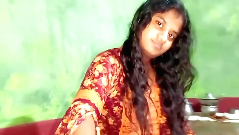 Indian girl is on her knees and she is playing with her pussy