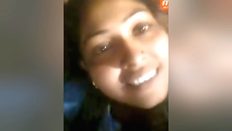 Beautiful brunette girl wearing a white blouse and stockings