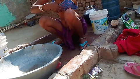 Indian solo girl shows her in the river with a soap