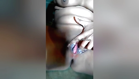 Indian brunette in a white dress shows her sexy body