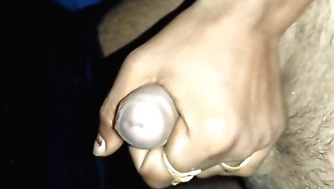 Funny guy is working hard on his penis and his friend is ready to help