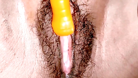 Indian girl with a hairy pussy masturbates in close up