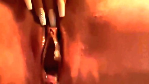 Hot blonde girl is having fun in a hot private waterfall