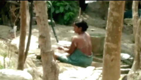 Beautiful brunette babe with big butt relaxes in the bath