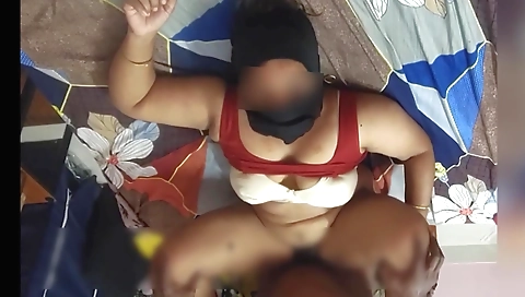 Indian housewife in a white bra is fucking in the bedroom