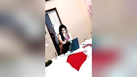 Indian solo video showing a hot brunette with big tits