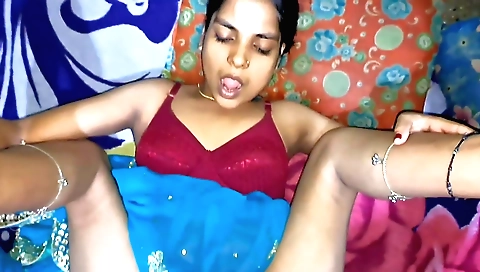 Indian chick fucks her husbands wife in the bedroom