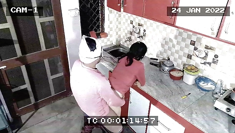 Hot amateur brunette caught with her male lover in kitchen