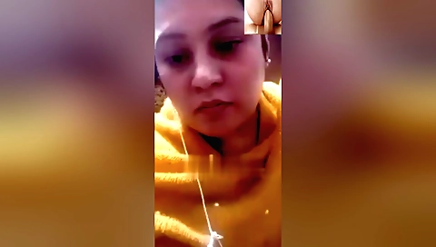 Amateur brunette with sexy tits is showing her boobs